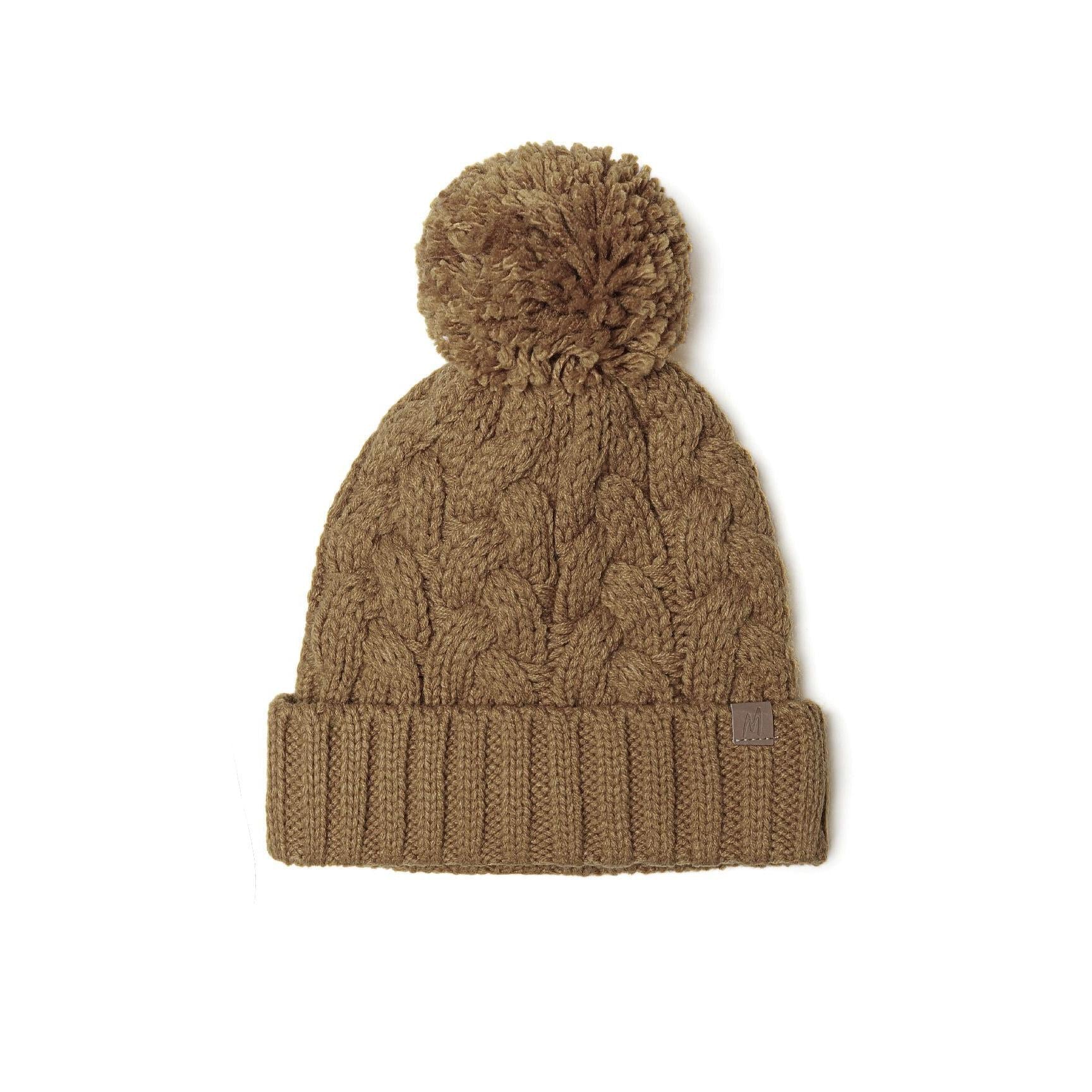 Beige cable knit beanie hat with fluffy pom pom on white background, showing textured knit pattern and ribbed cuff with small branded tab