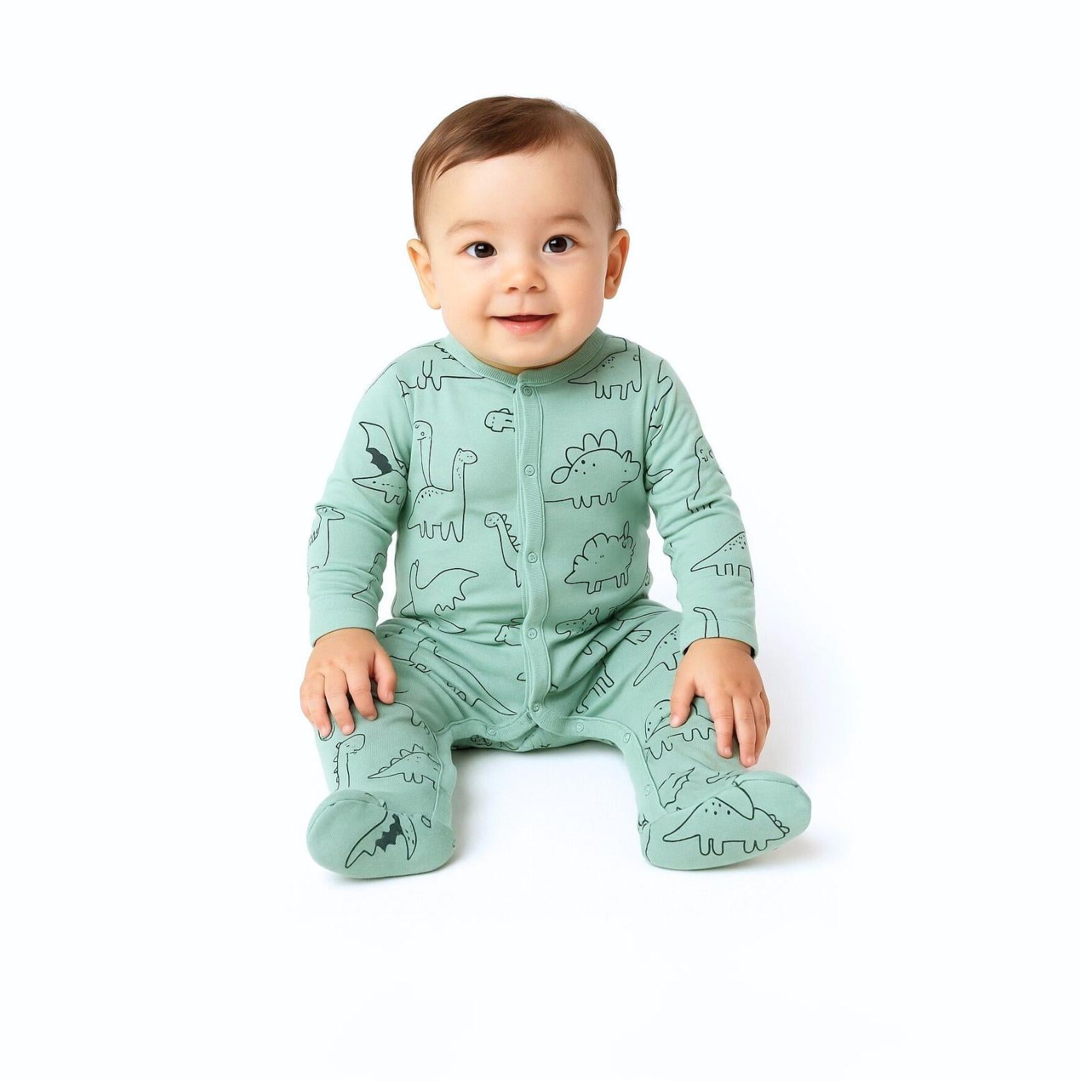 Single mint green sleepsuit with large star print pattern shown flat with snap button closure down the front
