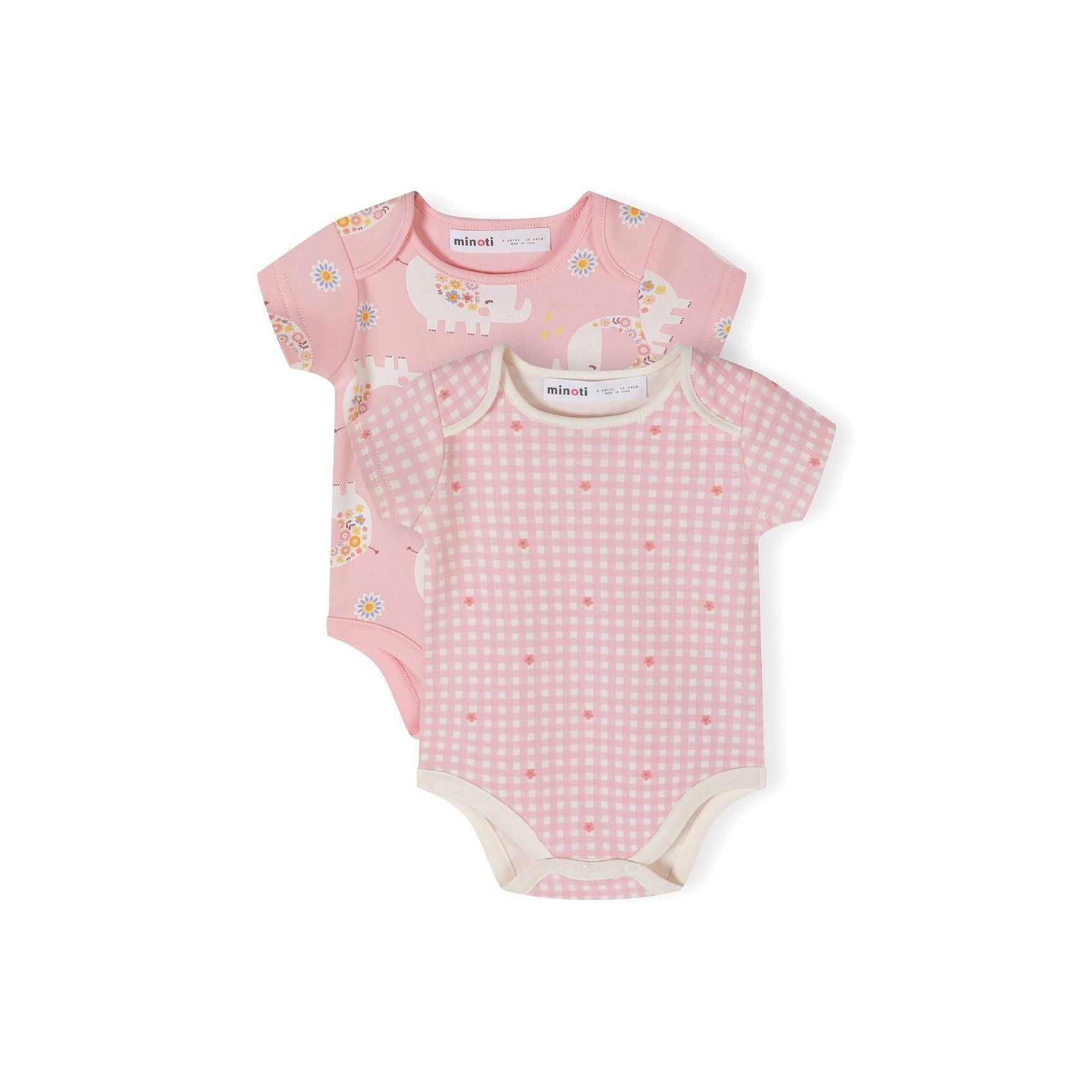 Two light pink baby bodysuits displayed on white background - one with elephant and floral prints, one with gingham pattern and hearts