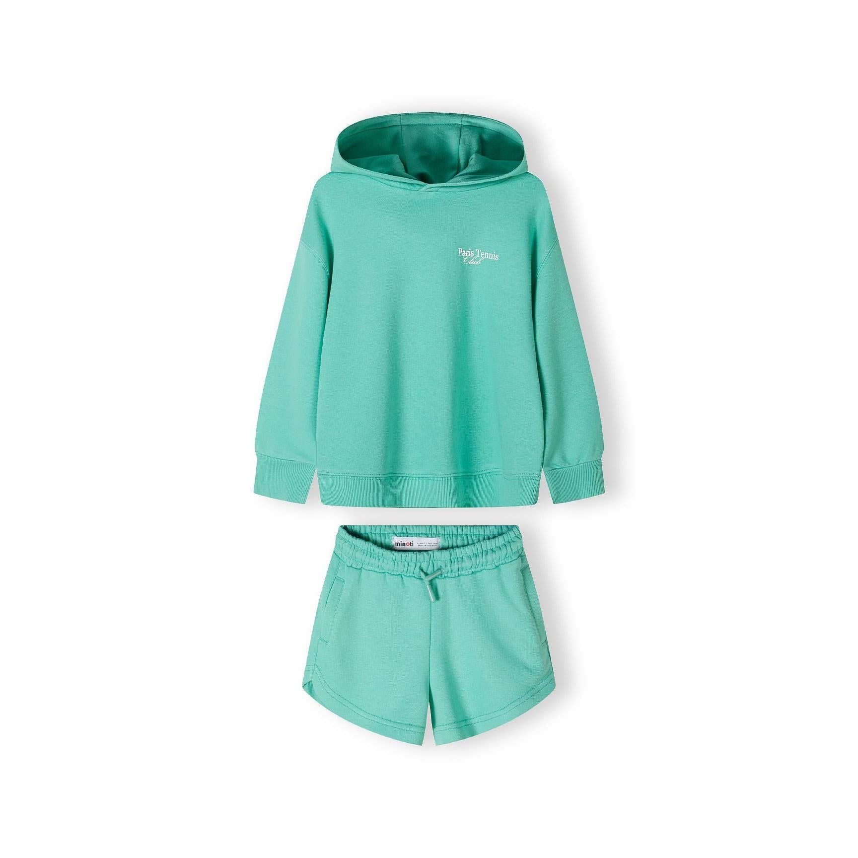 Back view of green hoodie showing hood detail and ribbed hem against white background