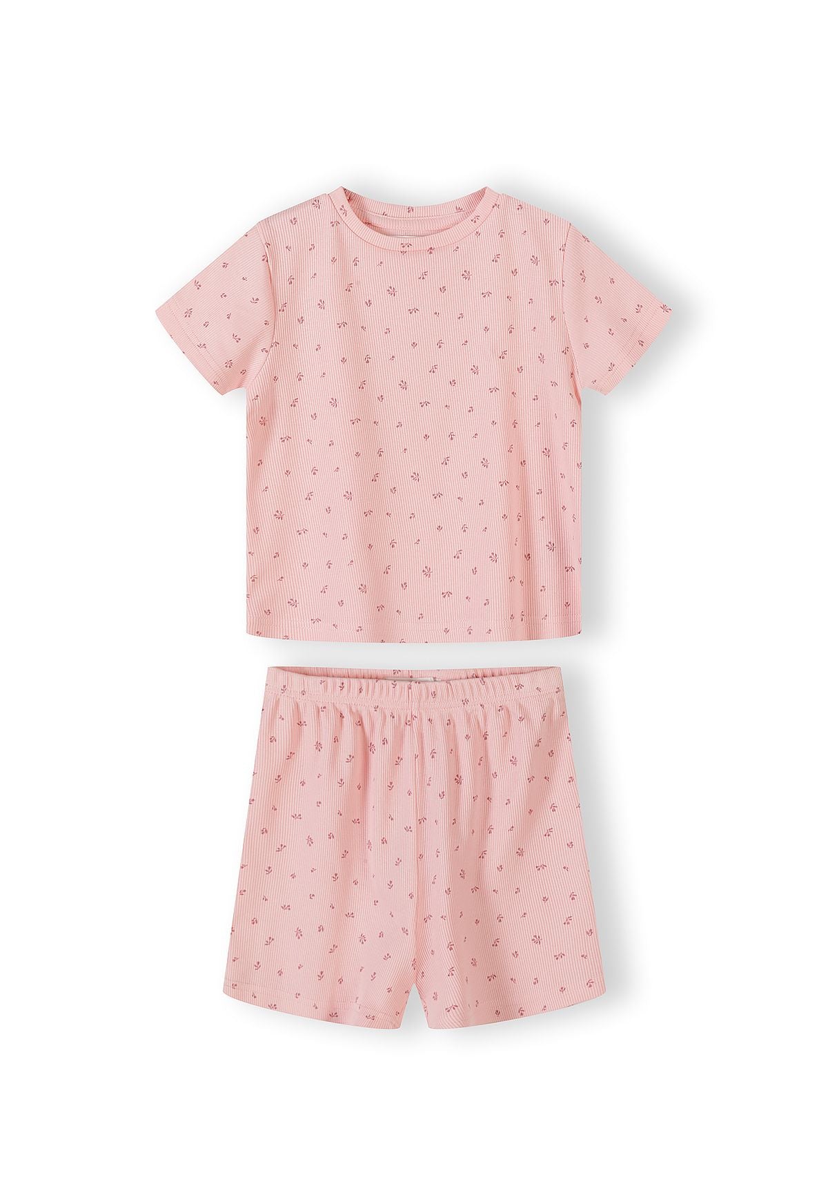 Detail view of pink ribbed fabric texture showing delicate floral print pattern and elastic waistband