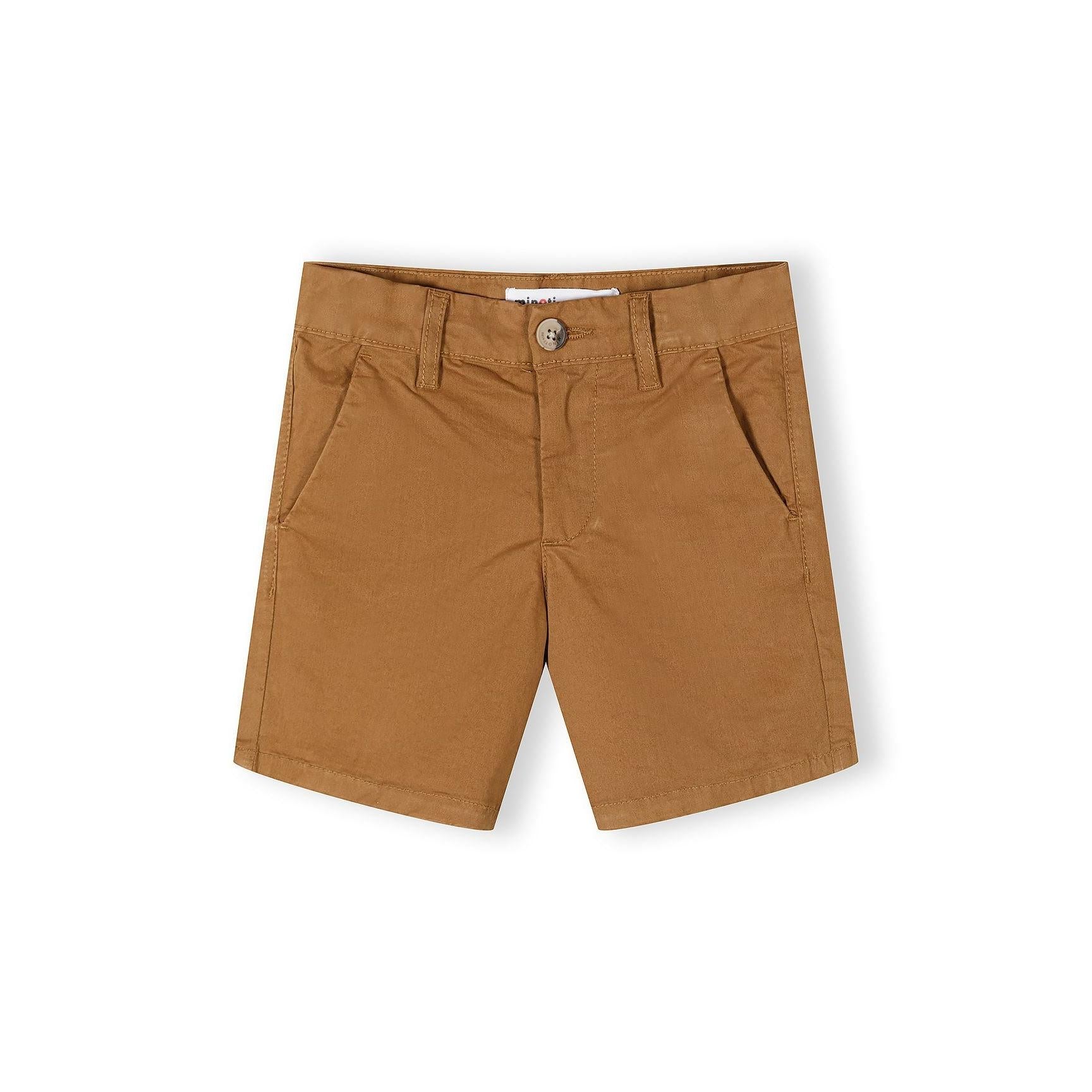Close-up of sand brown chino shorts showing detailed construction with button waistband, side pockets, and quality stitching against white background