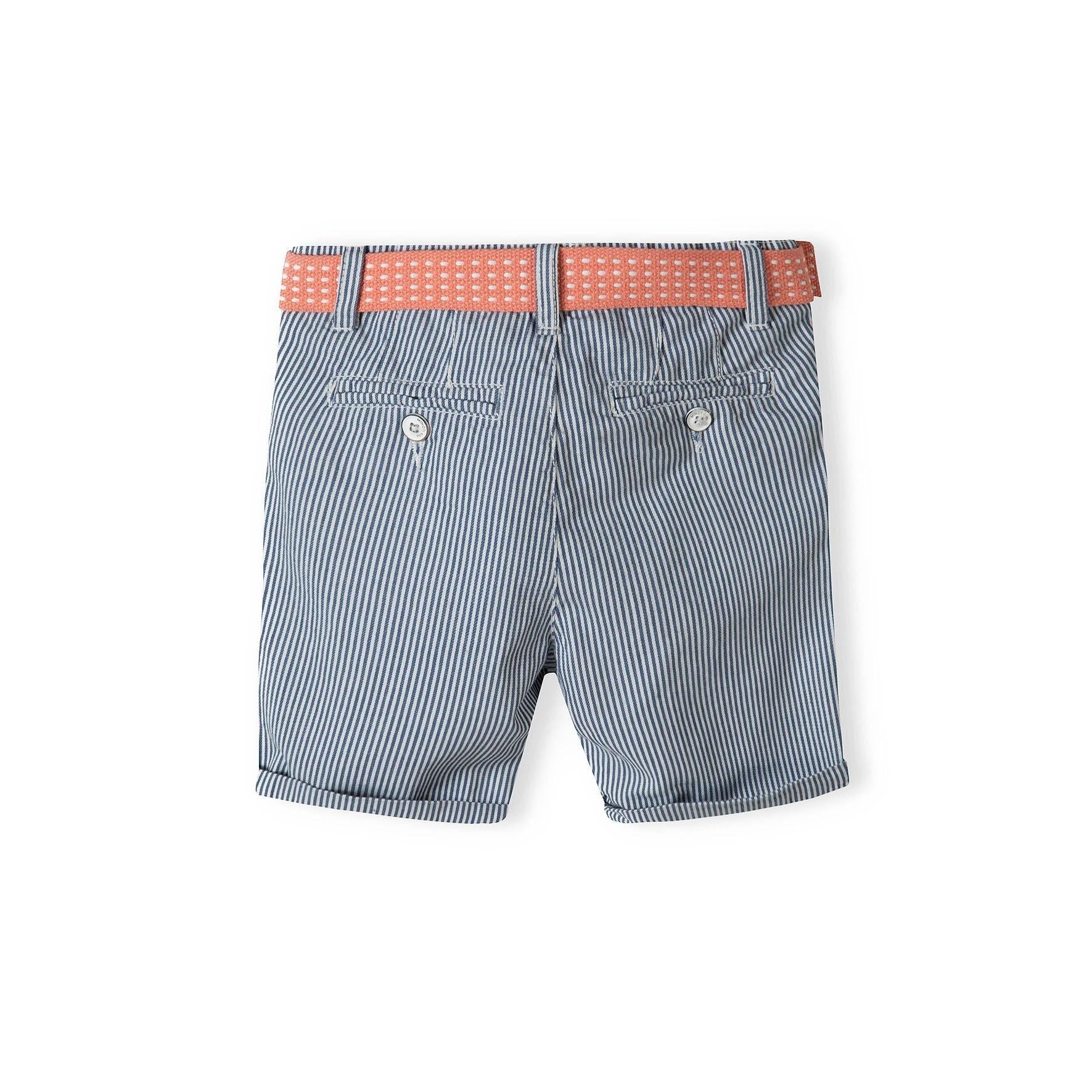Back view of blue striped chino shorts showing button-closure pockets and coral canvas belt with branded loops