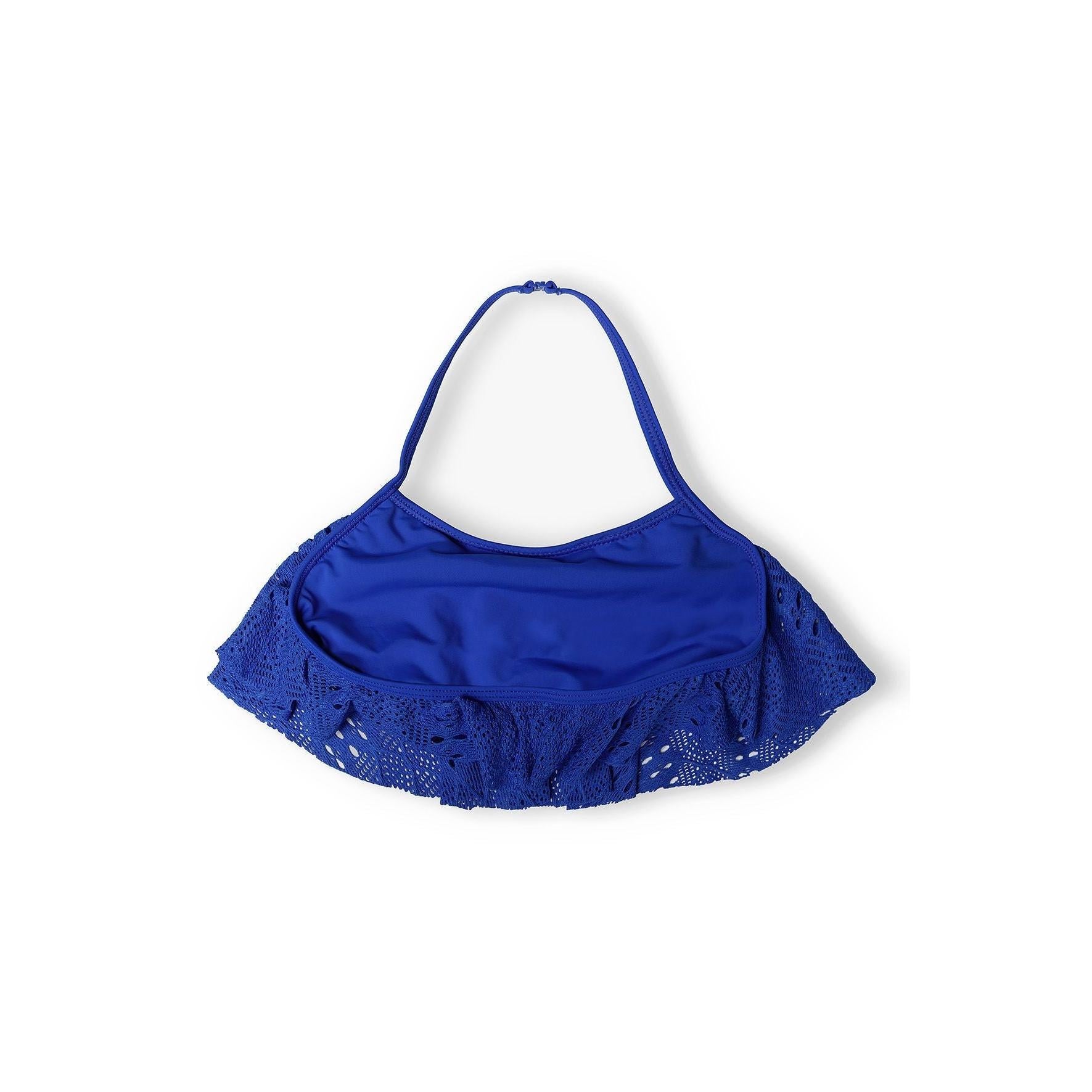 Back view of cobalt crochet bikini top showing halterneck tie closure and textured fabric detail against white background
