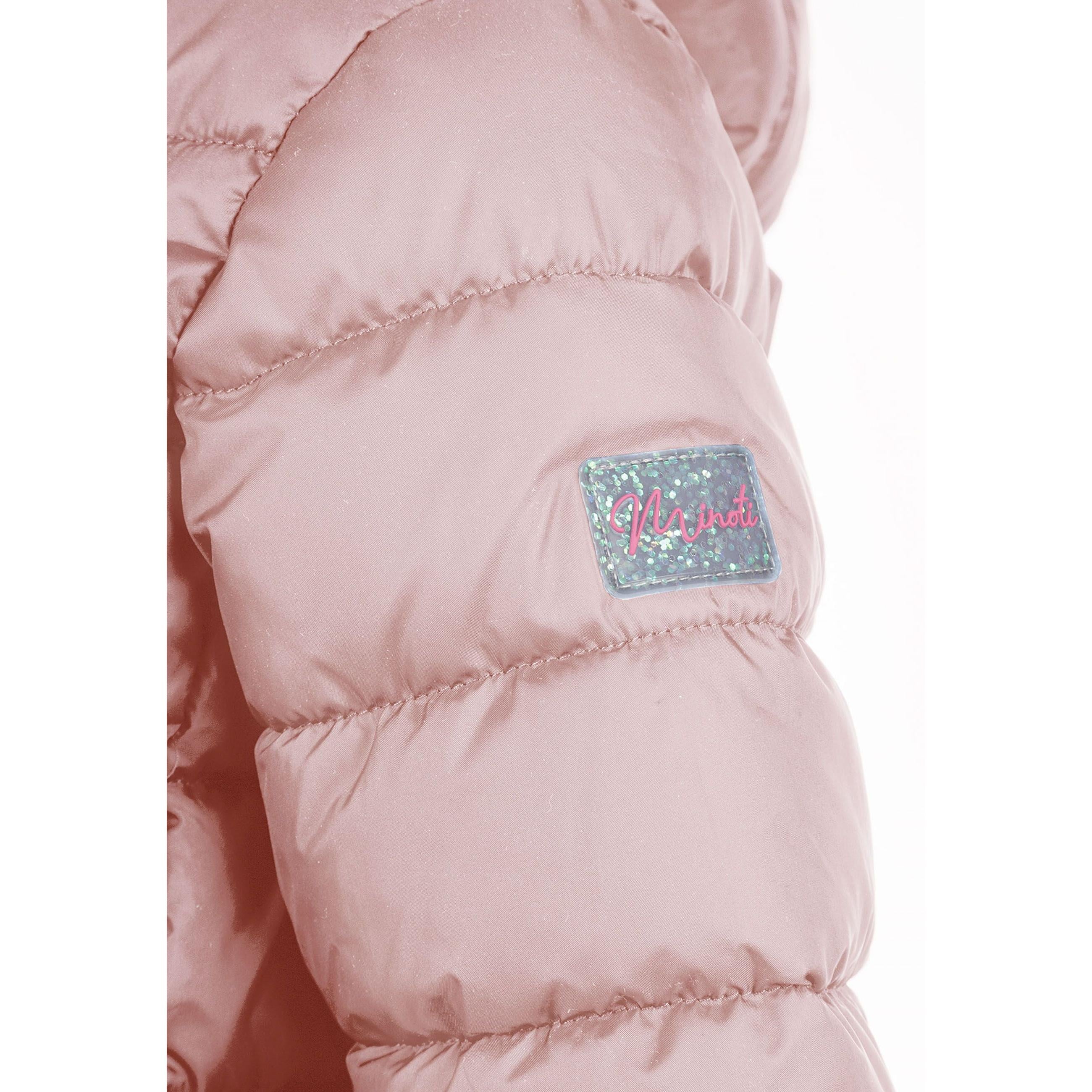 Detail view of pink quilted jacket fabric showing quilted texture, zip fastening and hood attachment