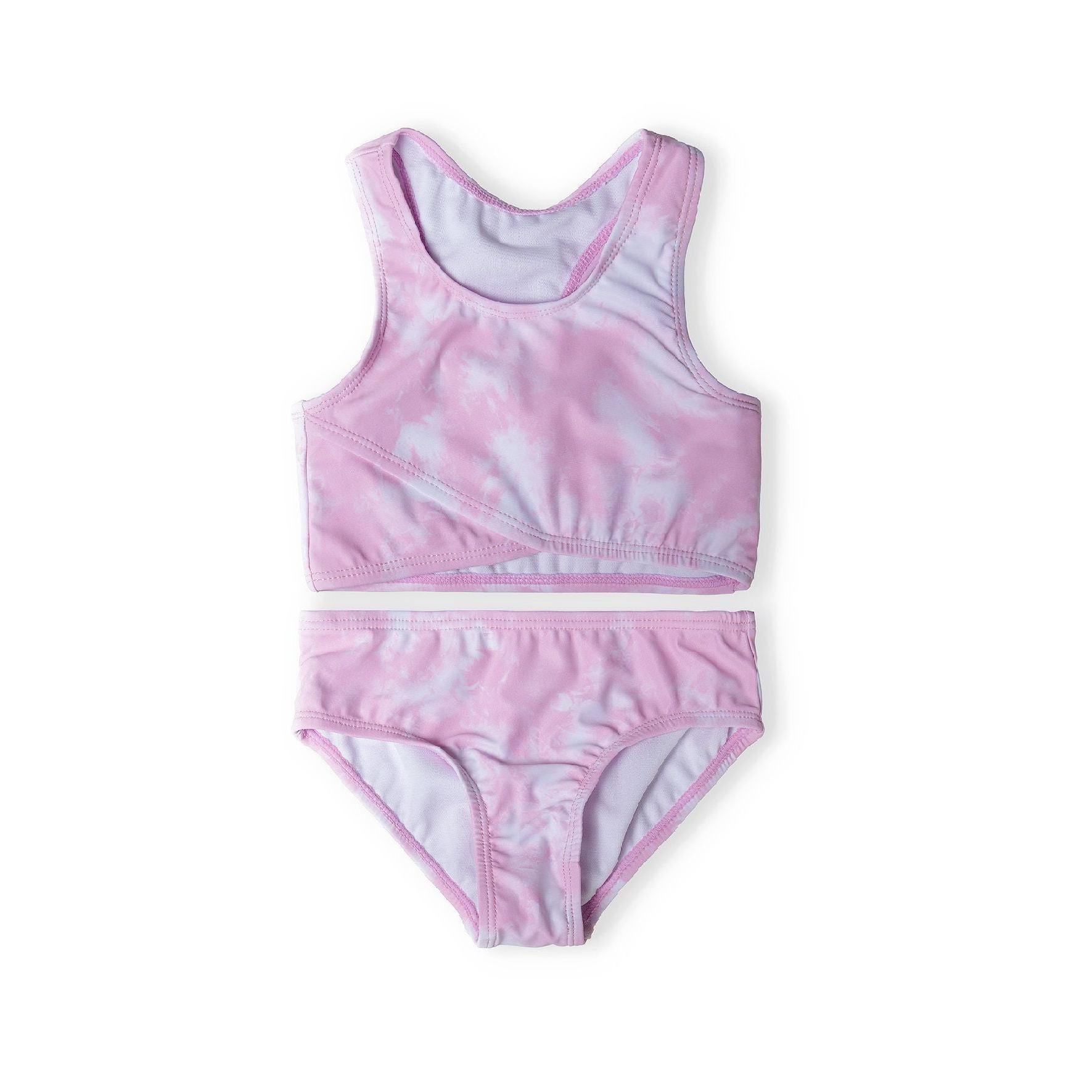 Pink tie dye crossover bikini set laid flat showing crop top with crossover straps and matching brief bottoms on white background