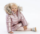 Girls’ winter jackets with a metallic sheen - a hit of the season for little elegant girls
