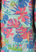 Girls rain jacket printed mint 1-6y featuring a vibrant floral pattern in mint green with a front pocket detail. 