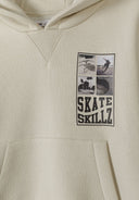 Boys grey hoodie with kangaroo pocket and graphic print, close-up view.