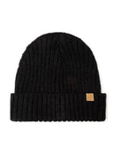 Close-up of a black rib knit hat with a small tab detail.