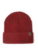 Close-up of a ribbed knit boys' hat in dark red with a tab detail on the cuff.