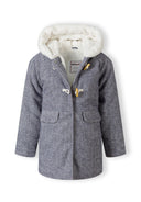Girls padded navy jacket with faux fur lining and hood, front view.