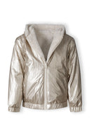Girls reversible jacket in metallic beige with full-length zipper and plush teddy fur lining.