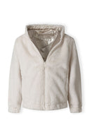 Girls reversible jacket in beige with plush teddy fur and metallic exterior, front view.