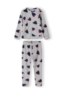 Girls long sleeve pyjama set in grey with heart print, featuring ribbed cuffs and elasticated waistband.