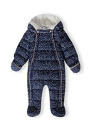 Baby unisex snowsuit in navy with floral print, front view, featuring attached mitts and full zip.