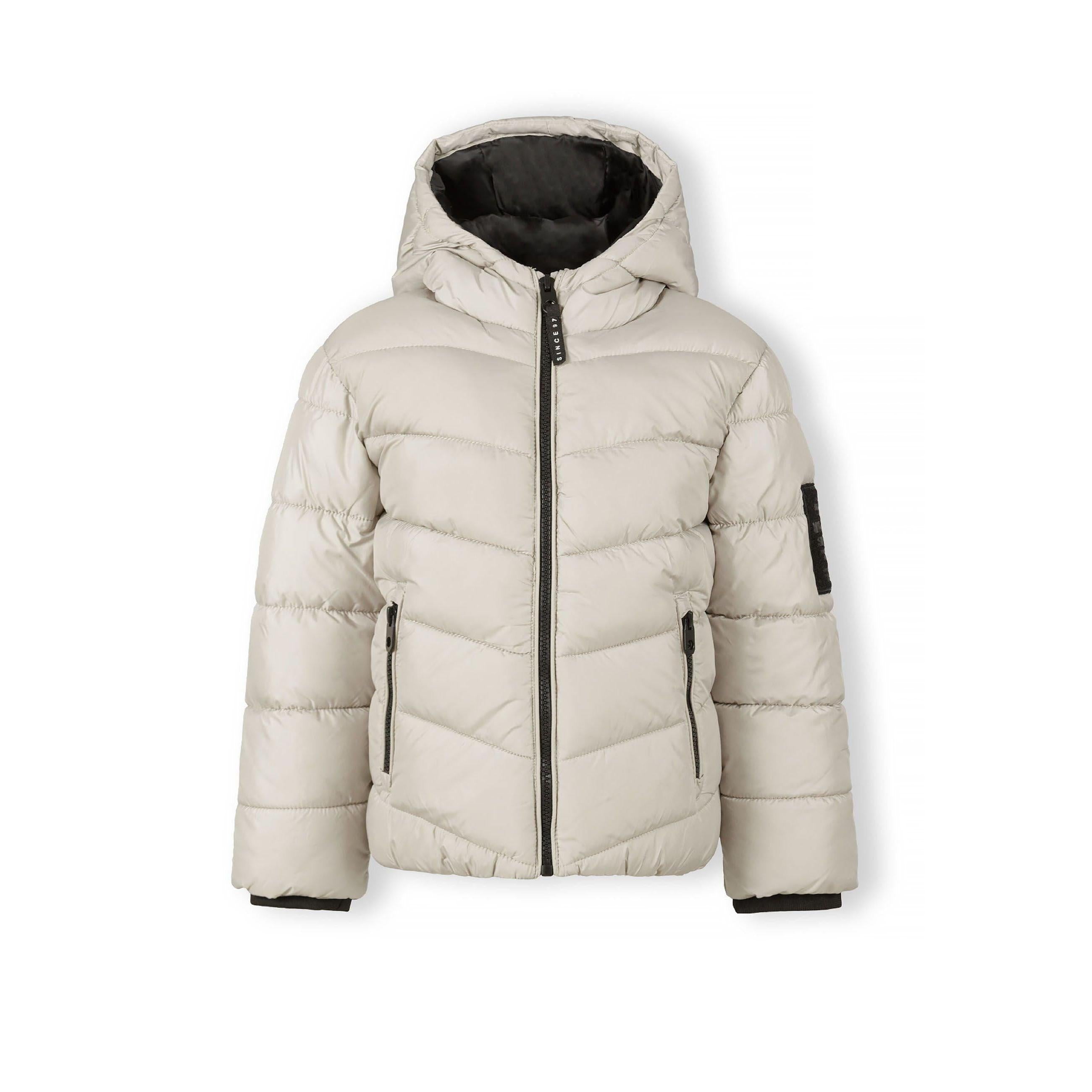 Grey quilted jacket laid flat showing chevron pattern, black hood lining and front zip closure
