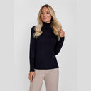 Close-up of a women's black turtleneck jumper with ribbed trims.