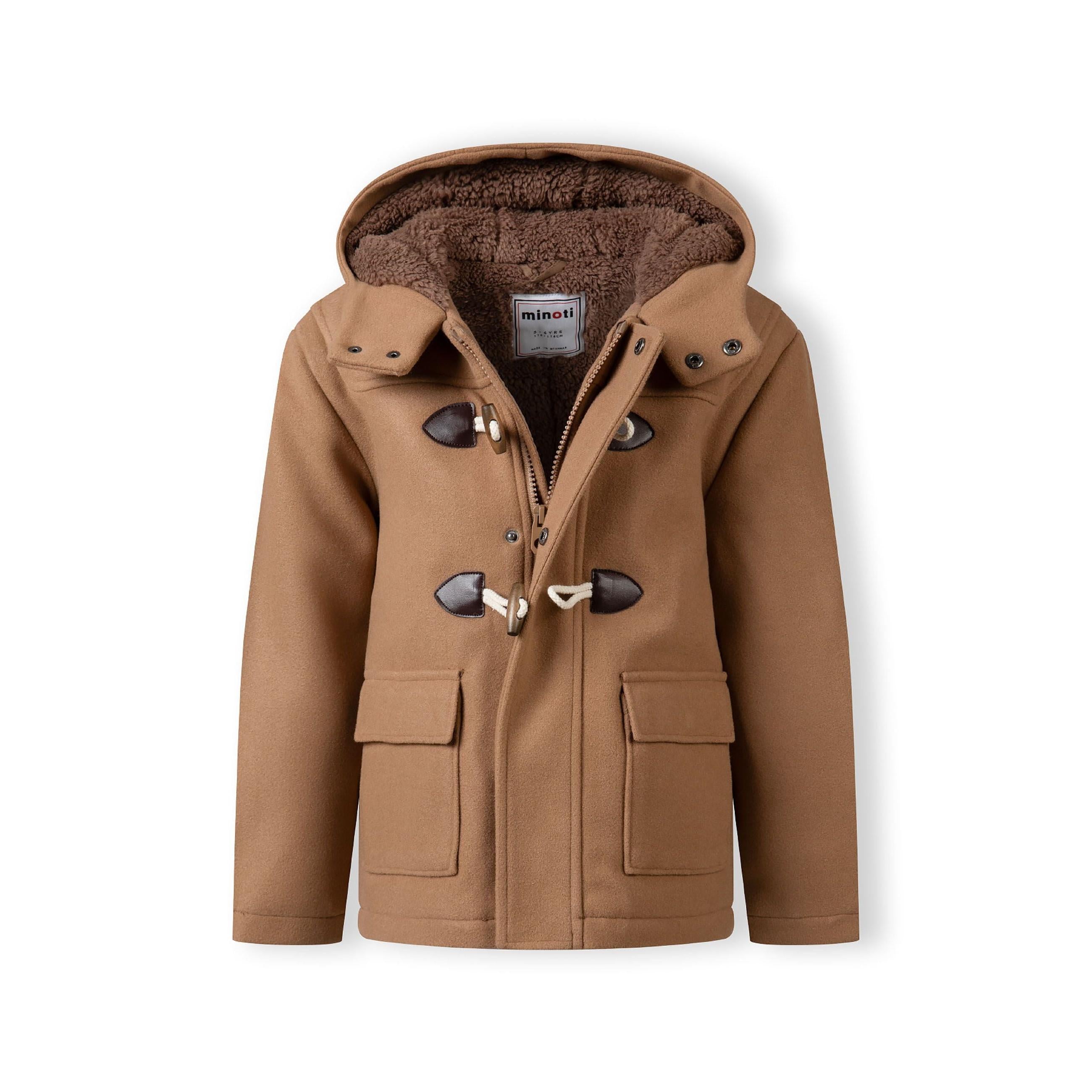 Close-up detail of beige duffle coat pocket with clean stitching and quality fabric texture