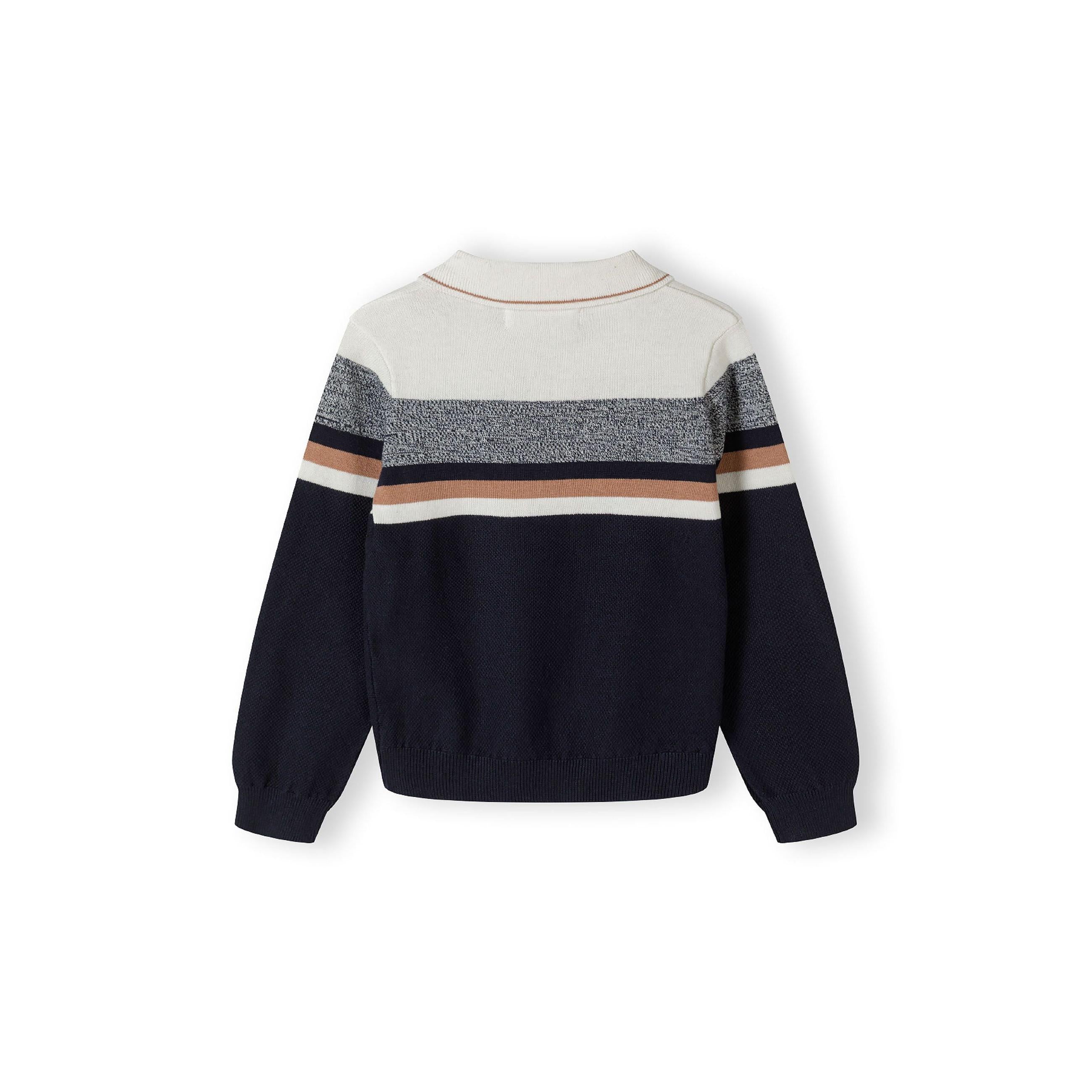 Back view of cream and navy striped polo jumper showing horizontal stripe pattern and ribbed hem detail on white background