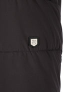 Close-up of a grey men's long jacket with a sleeve badge and grosgrain stitch accents.