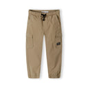 Boys cargo trousers in beige with elastic waist and side pockets, front view.