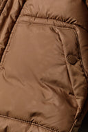 Boys padded jacket with hood brown 3m-3y featuring soft insulating fabric and a sleek pocket detail. Perfect for winter wear.