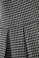 Girls dress dogtooth pattern pleated skirt black 3-14y featuring pleated detailing and classic black and white dogtooth fabric.