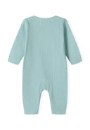 Babies long sleeve romper ribbed cream 0-18m in soft ribbed fabric, featuring long sleeves and legs, designed for infant comfort.