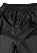 Close-up of women's black waterproof overpants waistband with elastic.