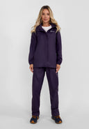 Women’s purple waterproof overpants, front view, featuring adjustable velcro cuffs.
