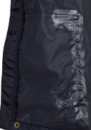 Detail of a navy waterproof jacket with a full front zip and elasticated cuffs.