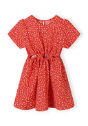 Girls short sleeve red dress with waist cut-outs and flared hem, front view.