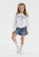 Girls white fleece crew neck sweatshirt with decorative print, front view.