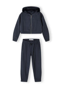 Cropped zip-through hoodie and jogger set in dark grey, featuring ribbed finishes and side pockets.