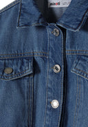 Detail of a girls cropped denim bomber jacket in navy, featuring a classic collar and button fastening.