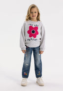 Girls straight leg jeans in navy with embroidered floral accents, front view.