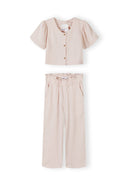 Girls clothing set with a blouse featuring flared sleeves and wide-leg trousers with pockets.