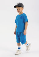 Boys blue short sleeve t-shirt and shorts set, featuring printed motifs and elasticated waistband.