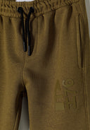 Detail of boys joggers with elasticated waistband and printed design.