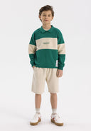 Boys fleece polo jumper in green with contrasting cream panels, featuring a classic collar and ribbed cuffs.