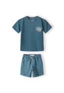 Boys short sleeve t-shirt and shorts set in blue, front view, featuring a tennis print on the chest.
