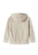Back view of a boys oversized cream hoodie with a hood and ribbed hem.