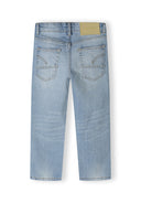 Back view of boys light blue ripped straight leg jeans with two back pockets.