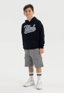 Boys grey knitted cargo shorts, front view, featuring large side pockets.