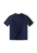 Boys short sleeve rash top in navy, back view with raglan sleeves and stand-up collar.