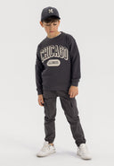 Boys grey cargo trousers with elastic waistband, featuring two side pockets.