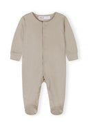Neutral beige baby sleepsuit with long sleeves and snap closures, designed for comfort and ease in kids fashion.