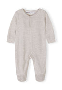 Neutral beige baby sleepsuit with long sleeves and footed design, featuring a simple and comfortable style for infants.