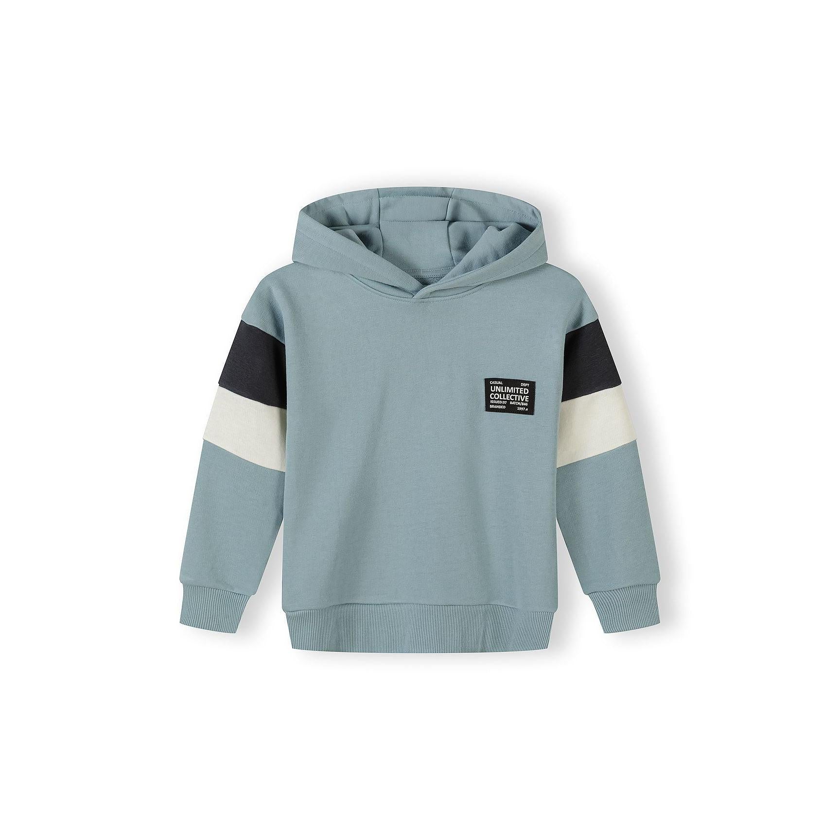 Sage blue joggers with elasticated waistband, drawstring and branded 'Unlimited Collective' patch on left leg, shown flat against white background